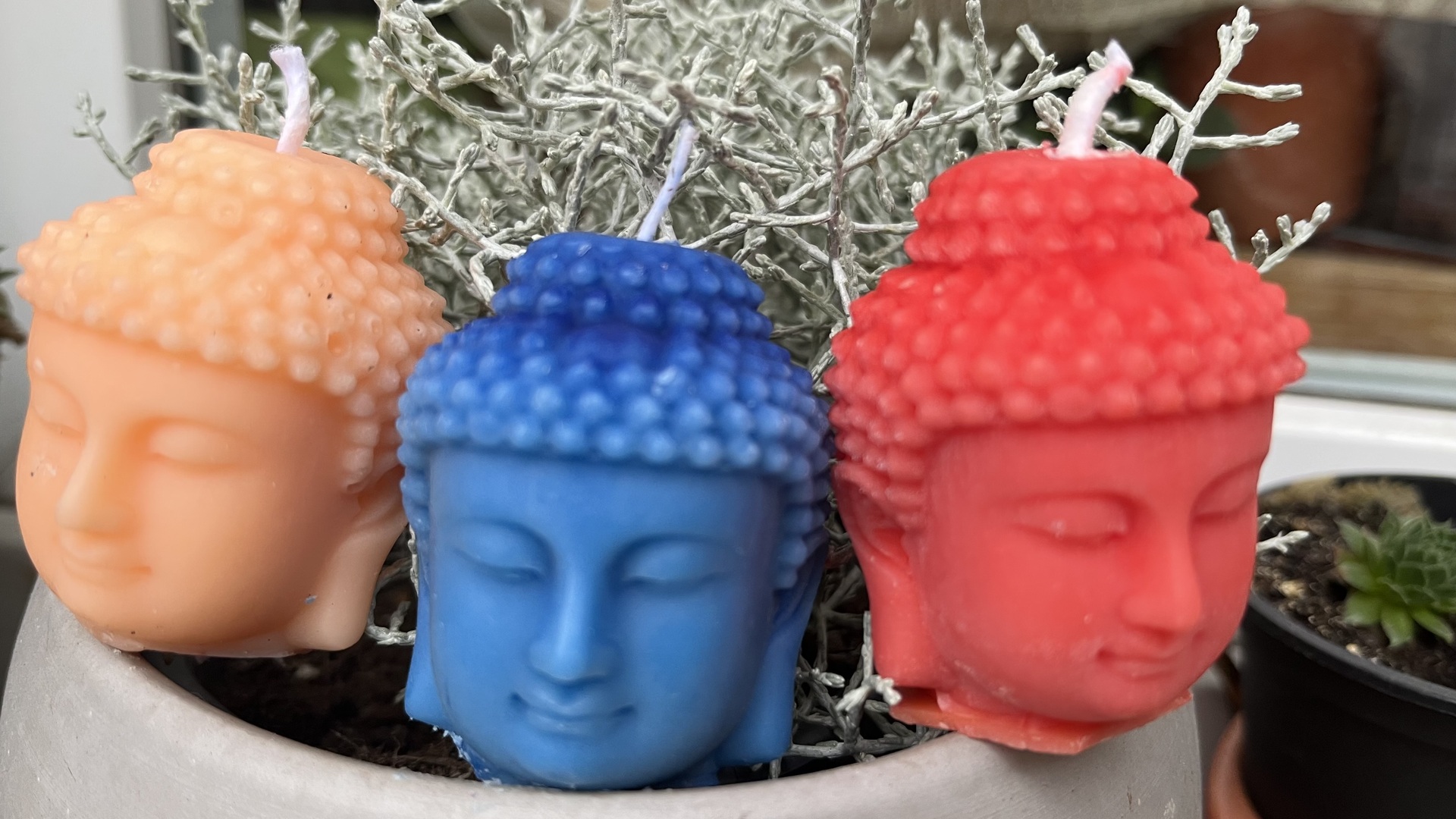 Gyertyák - Buddha fej gyertya - Narancs színű  Buddha fej gyertya 